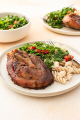 Enjoy a hearty meal with turkey paired with gluten-free pasta and a fresh salad of seasonal...