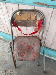 broken and ugly foam folding bench