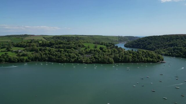 Greenway, River Dart, South Devon, England: DRONE VIEWS: Flying southwards over the River Dart in the direction of Greenway House. South Devon is a popular UK holiday destination.