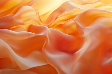 Fototapeta premium Radiant, flowing fabric with warm, light orange tones.