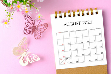 August 2026 desk calendar for the organizer to plan and reminder and paer butterfly on pink background.