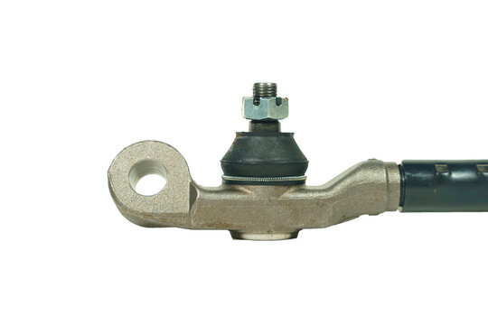 Closeup new car ball joints, white background.A Tie Rod End is a crucial component in a vehicle's steering system. It connects the steering rack.
