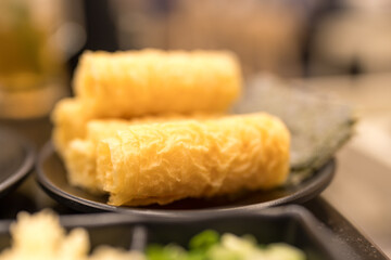Fried soybean rolls for hotpot. Selective focus
