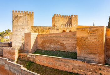Walls and towers of Alcazaba fortress in Alhambra, Granada, Spain