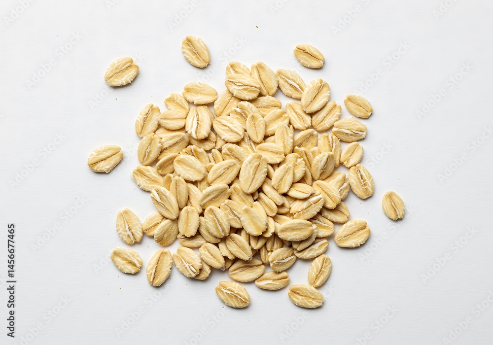 Aufkleber close up shot of a pile of dry uncooked rolled oats on a white surface in a studio setting view