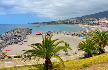 View on Torviscas beach in south Tenerife,Canary Islands,Spain.Playa de Torviscas.Travel or vacation concept.Selective focus.