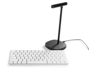 Professional microphone and keyboard on white background