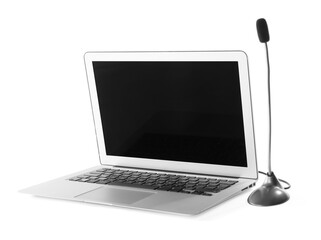 Professional microphone and laptop on white background