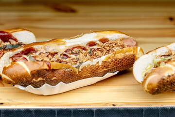 Gourmet Hot Dog on Wooden Surface