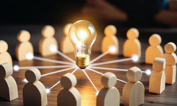 Centralized innovation strategy animation video. Glowing lightbulb placing in center of connected wooden figures animated footage clip seamless HD motion graphics. Idea sharing concept