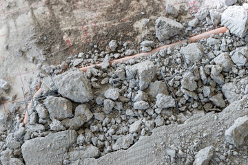 Broken floor slab in the house. Construction work