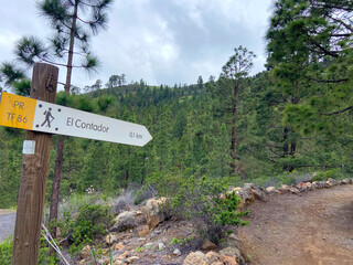 Hiking trail with arrow pointers sign in Tenerife, Canary Islands, Spain.Travel or vacation concept.
