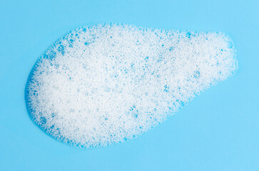 Texture of white foam. Cleansing mousse for the face or bath foam or washing powder.