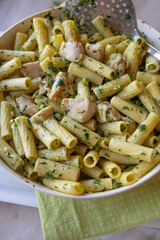Chicken with pasta in a delicious wild garlic  sauce fresh and homemade cooked in a frying pan