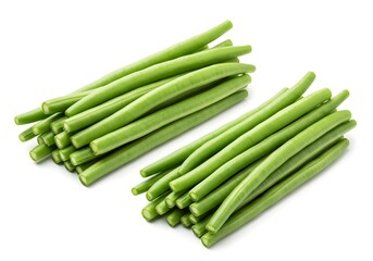 Two piles of fresh green beans neatly stacked on a white surface in a studio setting close up shot