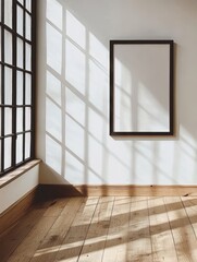 Interior mockup with blank frame on wall and sunlight streaming through window in minimalist style room