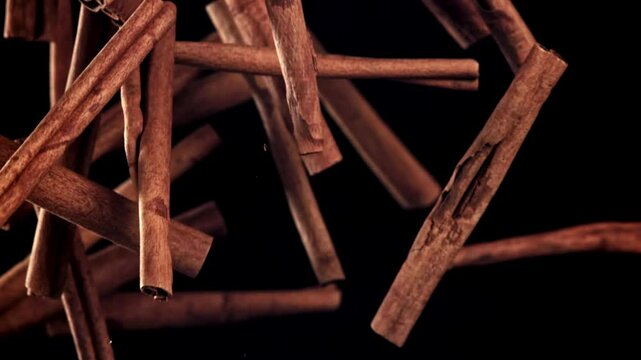 Cinnamon sticks fly up and down. Filmed on a high-speed camera at 1000 fps. High quality FullHD footage