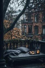 Cozy Balcony Retreat with Candles and Pillows on a Gloomy Autumn Day in the Cityscape