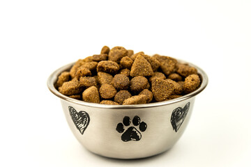 Metal bowl with pet food on a white background. Banner for pet food advertising
