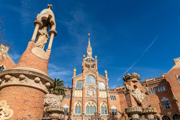 Sant Pau clock tower with sculptures and carvings