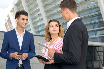 Teamwork. Business meeting. A group of young people are discussing a new project.
