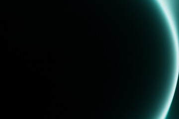 Abstract teal glow on black background.