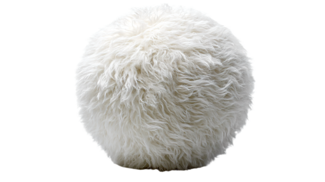 a white fluffy ball sitting on top of a white floor