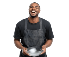 Happy chef, with dark skin, laughs while holding a bowl of ice on a transparent background.