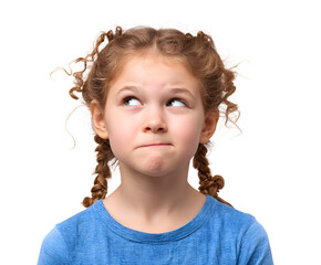 A cute girl with curly pigtails looks up, appearing thoughtful with a slight smile, in a portrait.