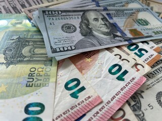  dollar and euro bills. Close-up footage of US dollar and Euro banknotes. Financial concept showing international currency, exchange rates, money circulation, and global economy