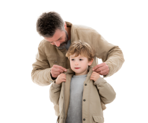 A father assists his young son by buttoning up his jacket, showing a tender moment of care and love.