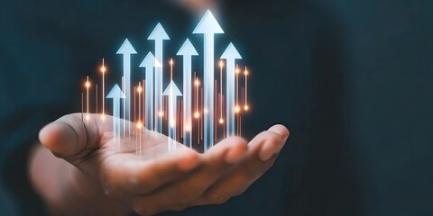 Hand holding growth business strategy arrow concept on success target improvement with increase development graph profit or economy investment income target and goal increase.