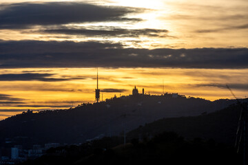 Hill silhouette at sunset