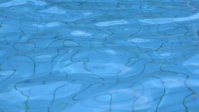 water rippled on swimming pool