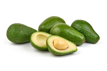 Fresh green avocados, whole and halved with seed, isolated on white background.