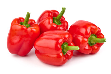 Fresh red bell peppers isolated on white background.