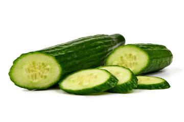 Fresh cucumber, whole and sliced, on white background.
