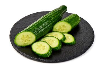 Fresh cucumber, whole and sliced, on white background.
