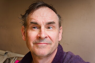 Handsome mature man smiling	

