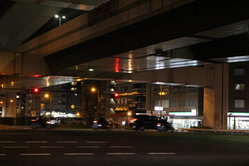 Mall in Osaka with Neon Lights and Reflections