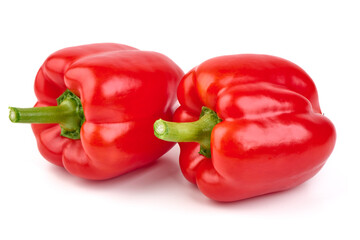 Fresh red bell peppers isolated on white background.