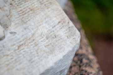 Close-up of weathered stone surface with texture and natural patterns
