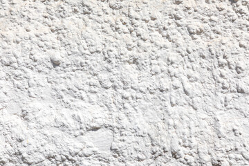 white background of structured plaster wall