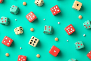Colorful dice used for gaming are displayed on a green background, presented in a flat lay arrangement