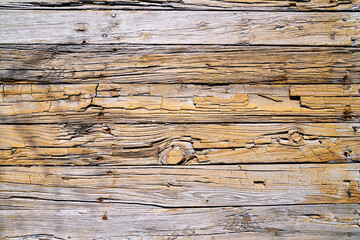 Old plank wood flooring with texture and wear. Scuffing and rotting.