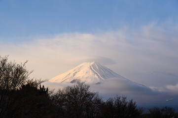 Fuji mountain at Lake Kawaguchiko in Yamanashi, Japan. Mount Fujisan with cloud cap on the peak in the morning.