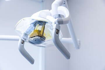 Modern Dental Equipment: A Close-Up View of an Advanced Dental Light Designed for Bright...