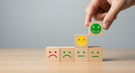 Hand Arranging Smiling Faces Wooden Cubes Positive Feedback Satisfaction Emotions Gray Backdrop