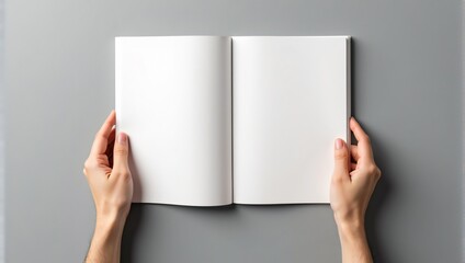 Hands holding open blank notebook mockup