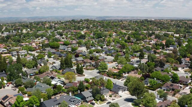 Aerial drone view of Paso Robles California suburb - homes, trees, hills 08